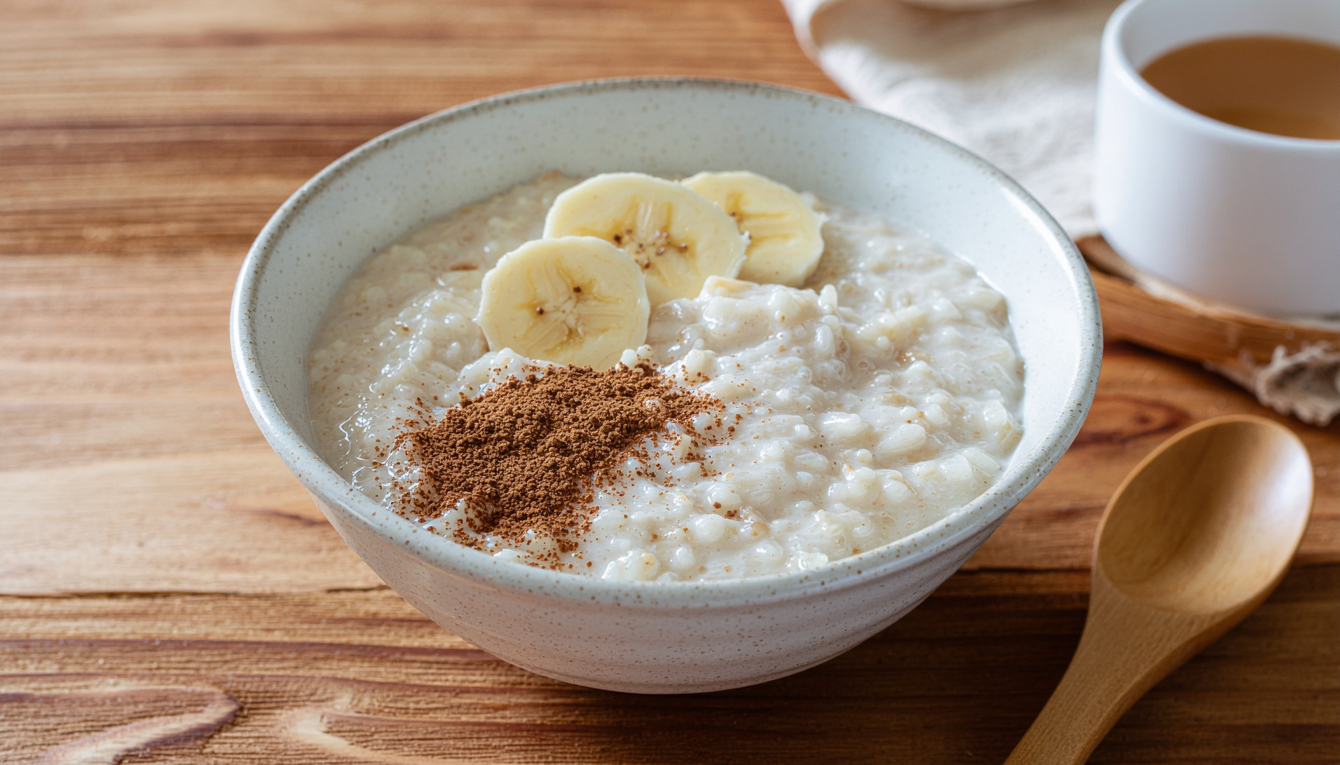 Cinnamon Banana Breakfast Rice - Warm rice porridge with banana and peanut butter