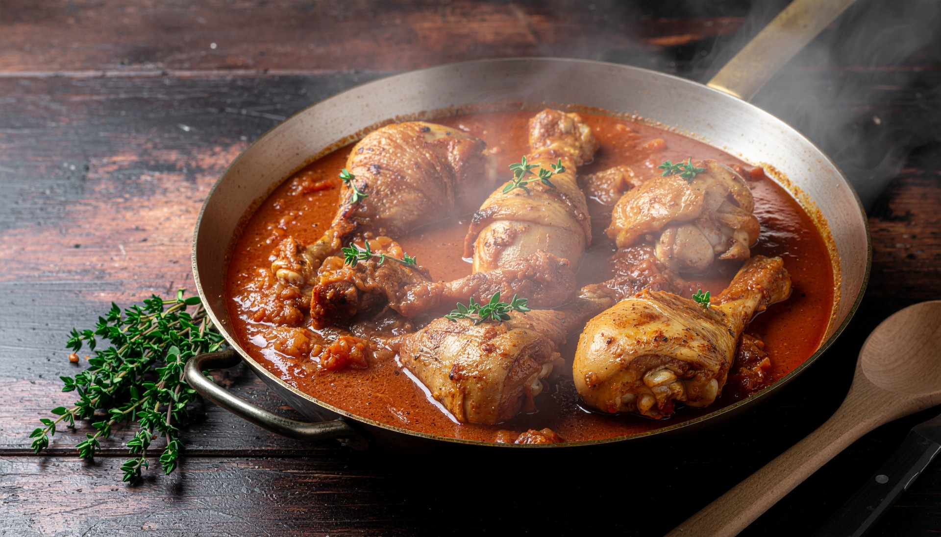 Rustic Chicken Tomato Braise - Chicken thighs simmered in tomato sauce with vegetables