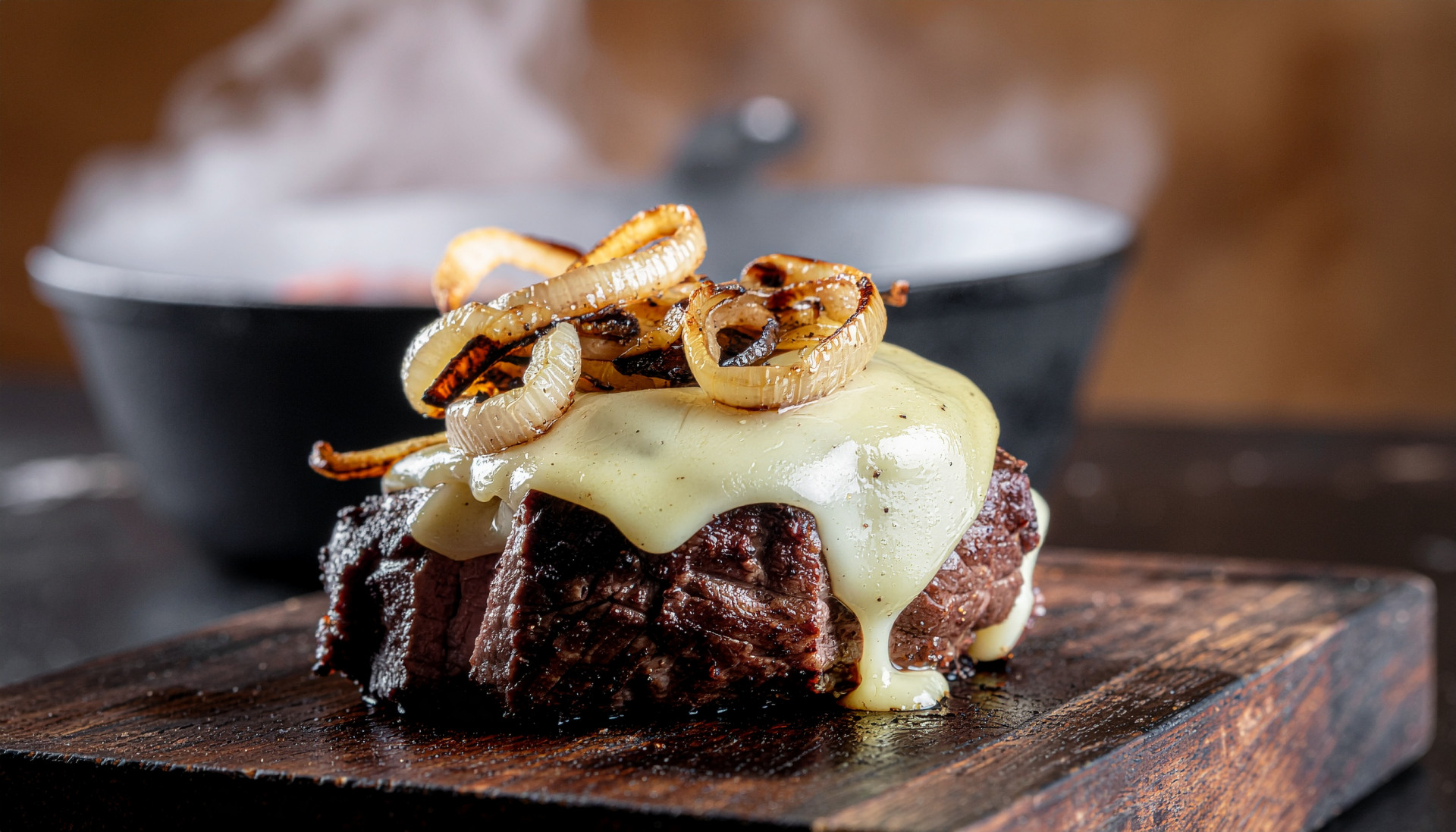 Ribeye with Melted Cheddar and Grilled Onions